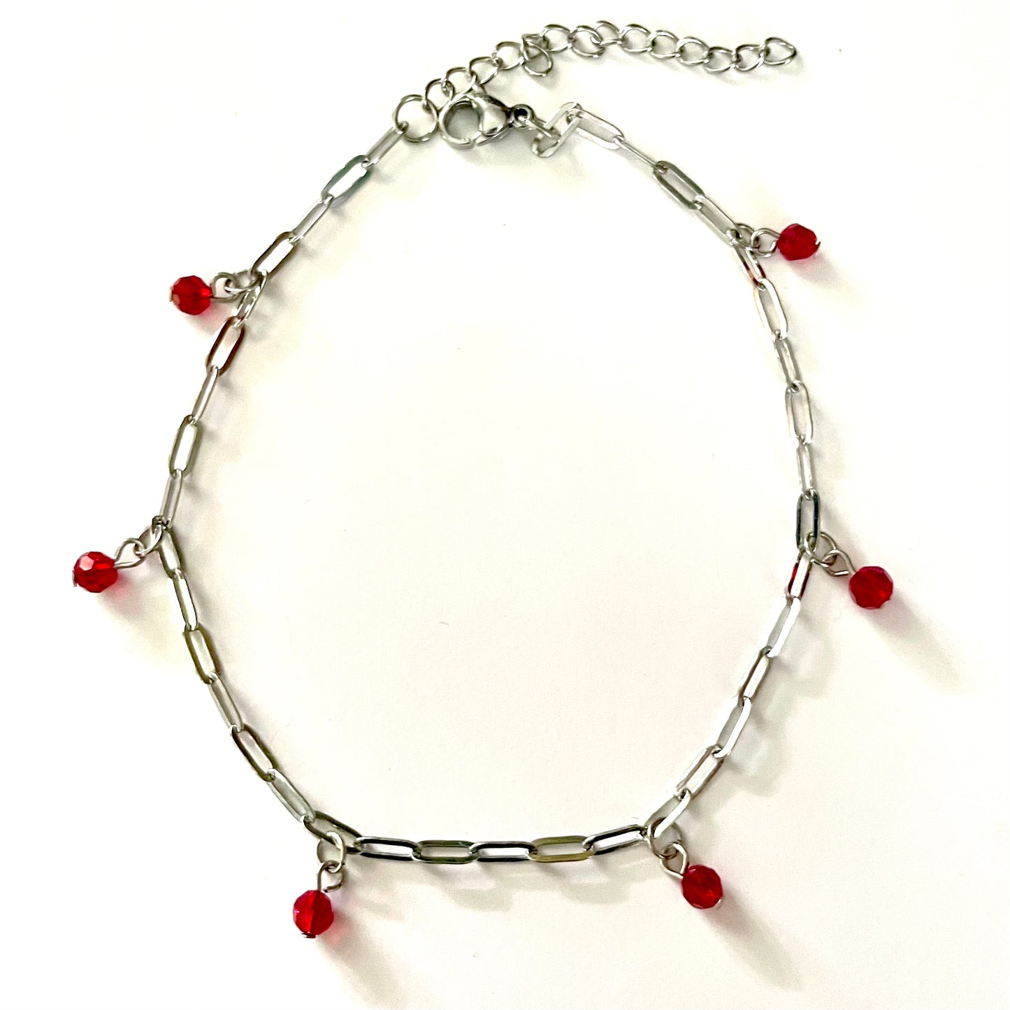 Chaîne de Cheville avec cristal rouge